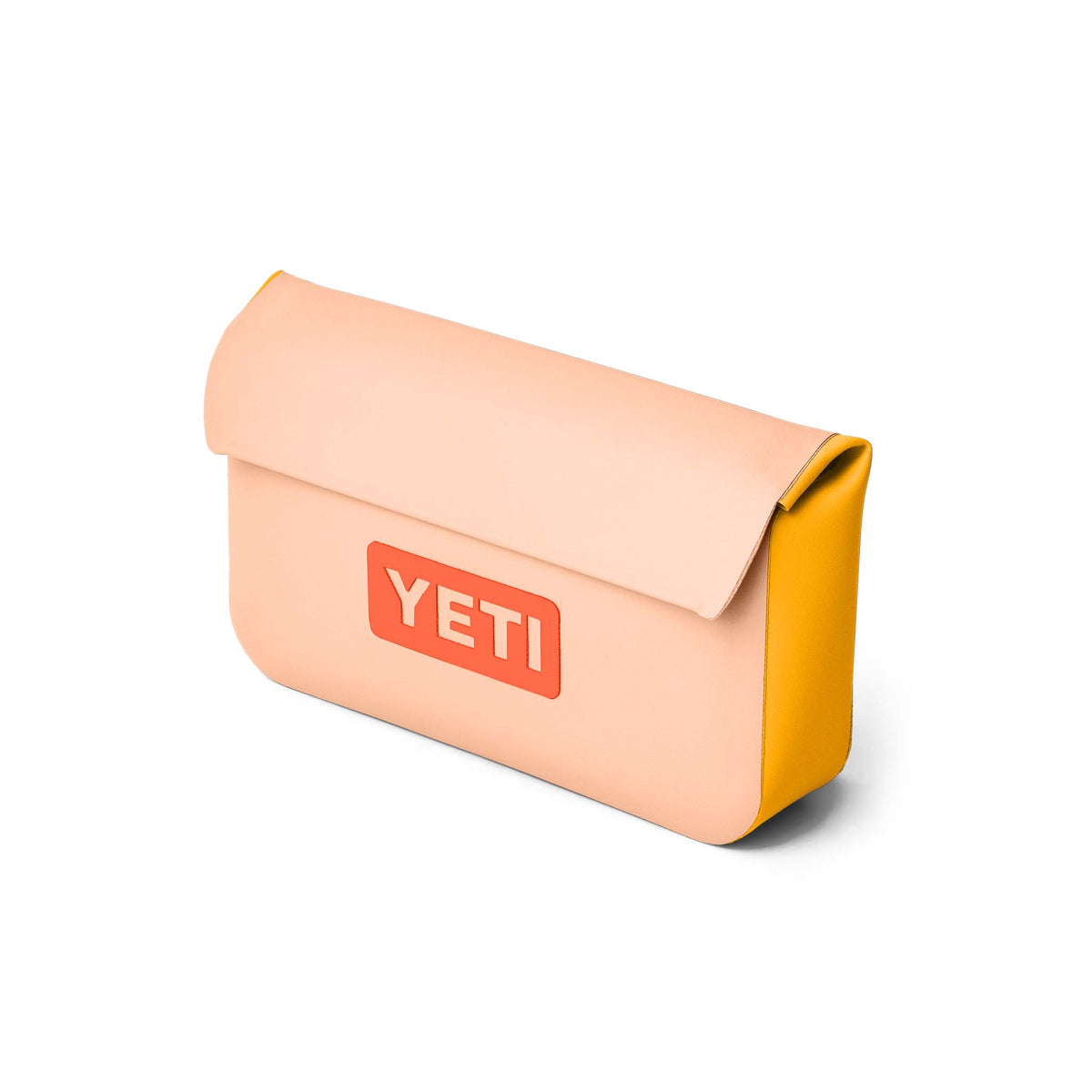 YETI SideKick Dry 1L waterproof gear case in a vibrant Peach/Beekeeper color, featuring a sleek rectangular shape, magnetic HydroShield closure, and durable DryHide shell. The peach-colored body is contrasted by beekeeper yellow trim and attachment points, designed to keep essentials protected and dry in any environment.