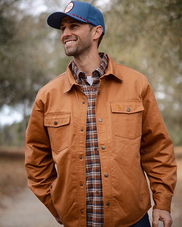 man smiling wearing a local boy shacket
