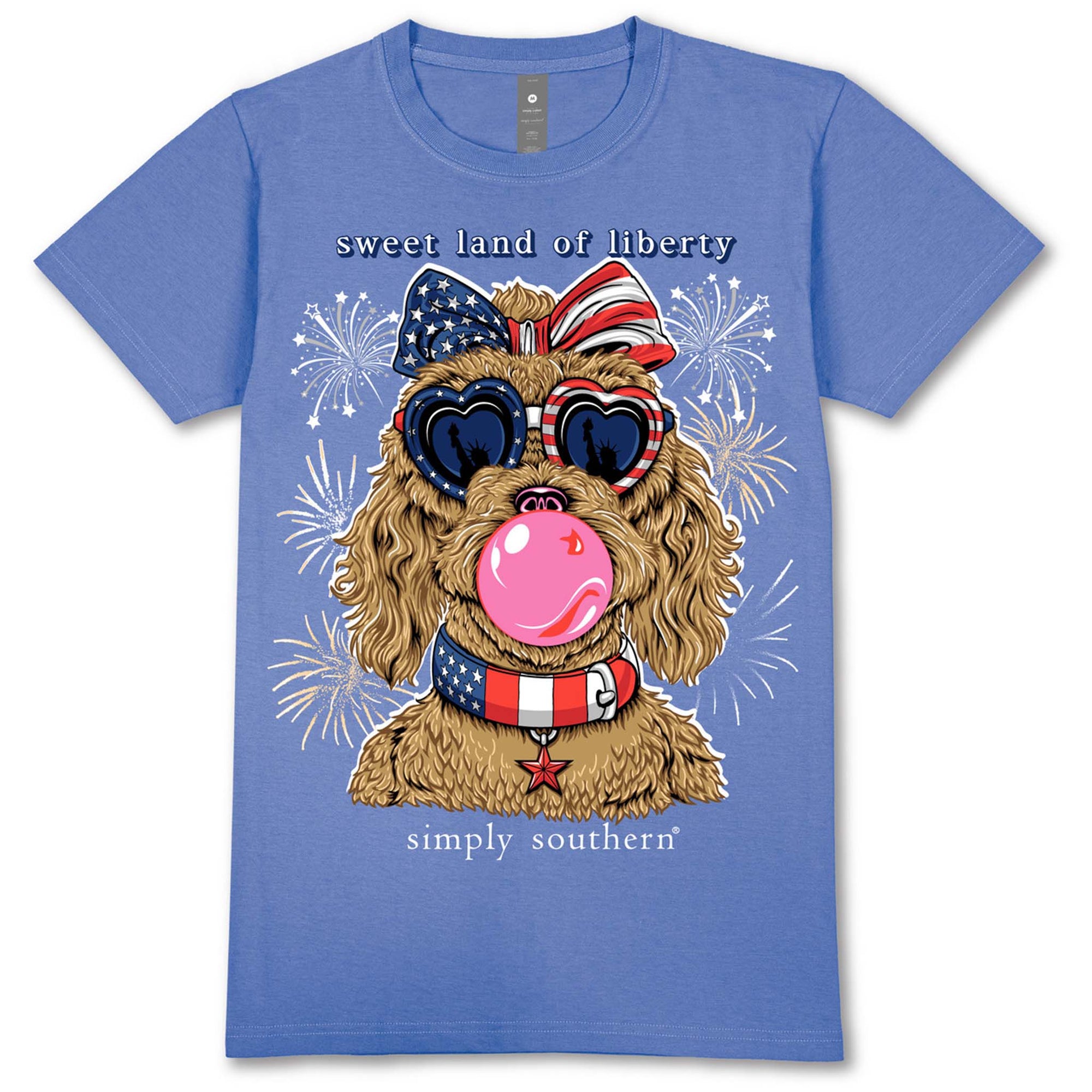 Simply Southern Dog Liberty Short Sleeve Tshirt, color wave blue, sizes S-XXL, 100% cotton, unisex sizing.DescriptionThe front design says, 'Sweet land of liberty' and a doodle breed dog in patriotic gear blowing a gum bubble with fireworks in the background. Patriotic bow centered on upper back., near the neckline.
