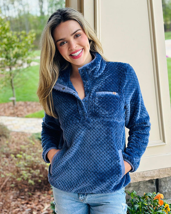 woman posing for camera wearing a simply southern pullover