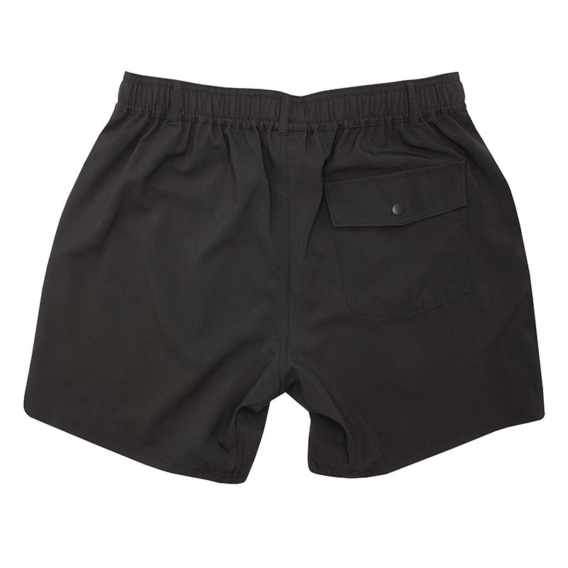 Back view of Local Boy Volley Shorts. The back pocket features a button snap closure.