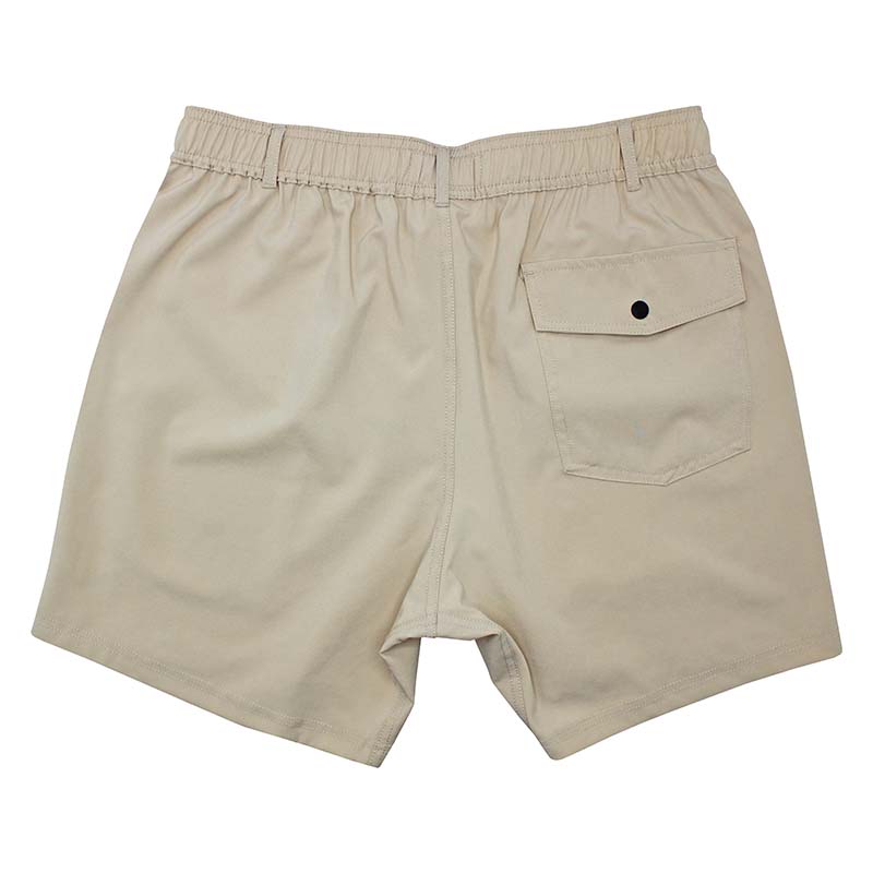 Back view of Local Boy Volley shorts in Khaki. The back pocket features a button snap closure.